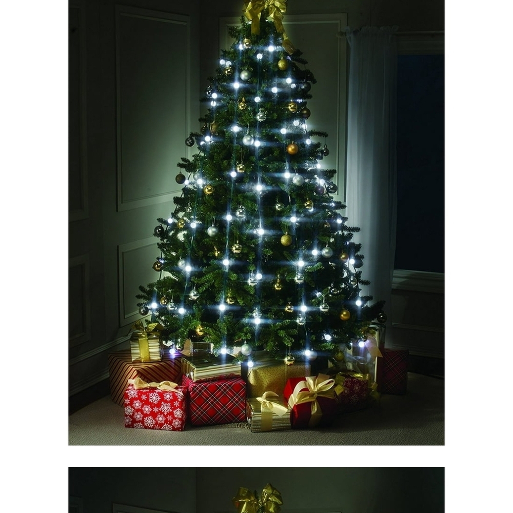 A Set Of Four Christmas Tree Lights White and Gold Accents
